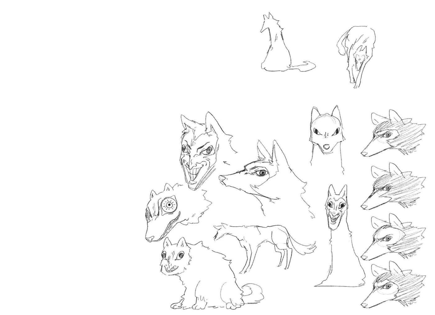 Creature design page showing many dog head studies and stylized dog variations.